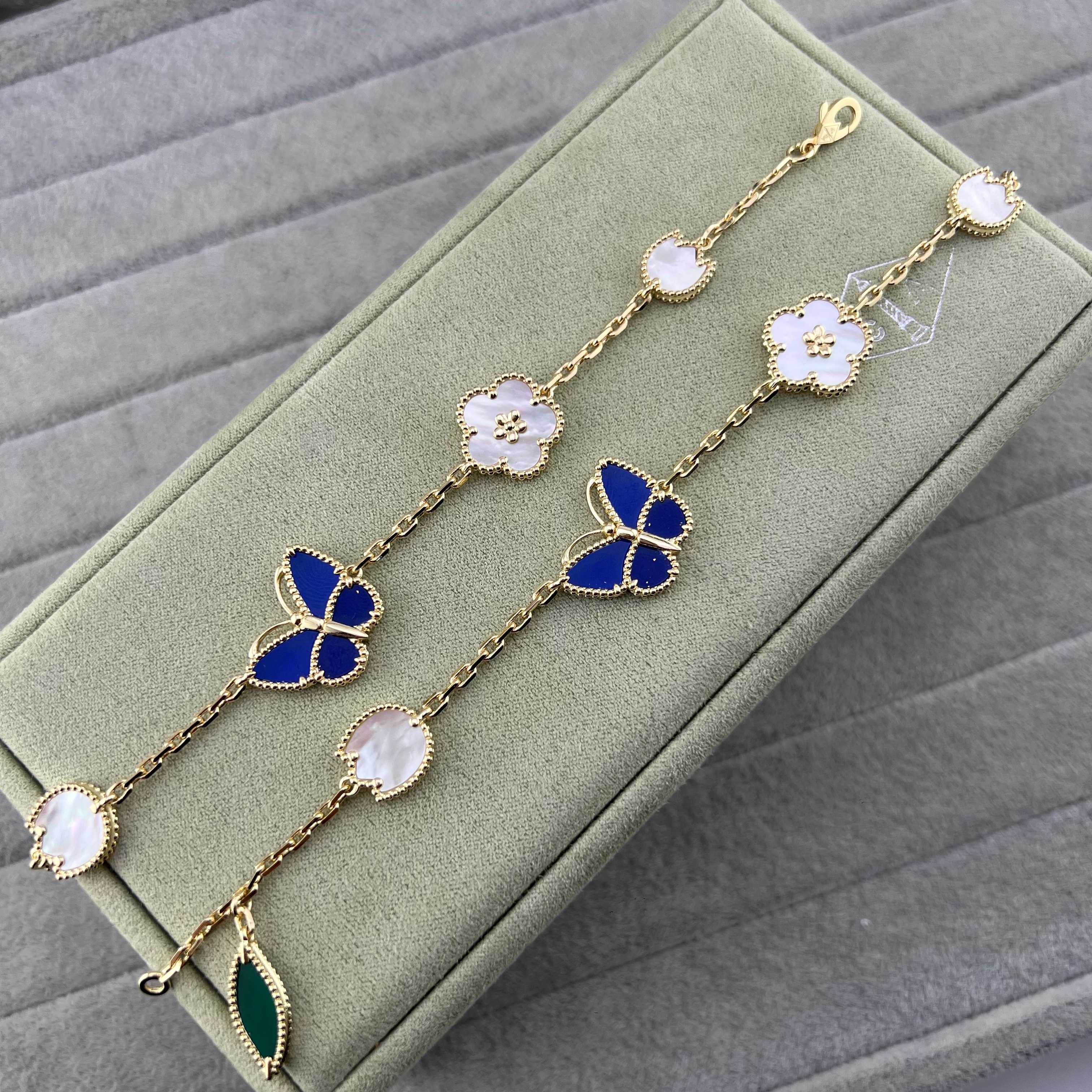 Butterfly, flower and leaf combination necklace