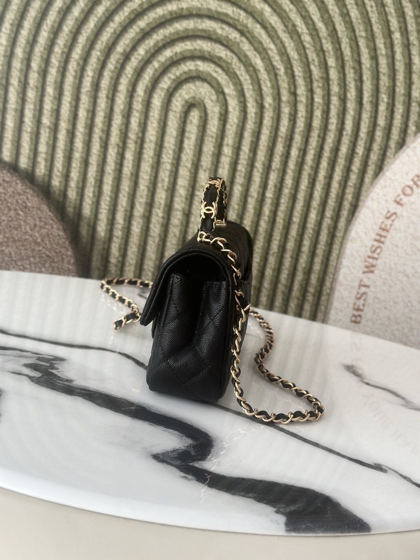Classic Flap Mini with Top Handle in Black Quilted Caviar Leather with Gold-Tone Hardware