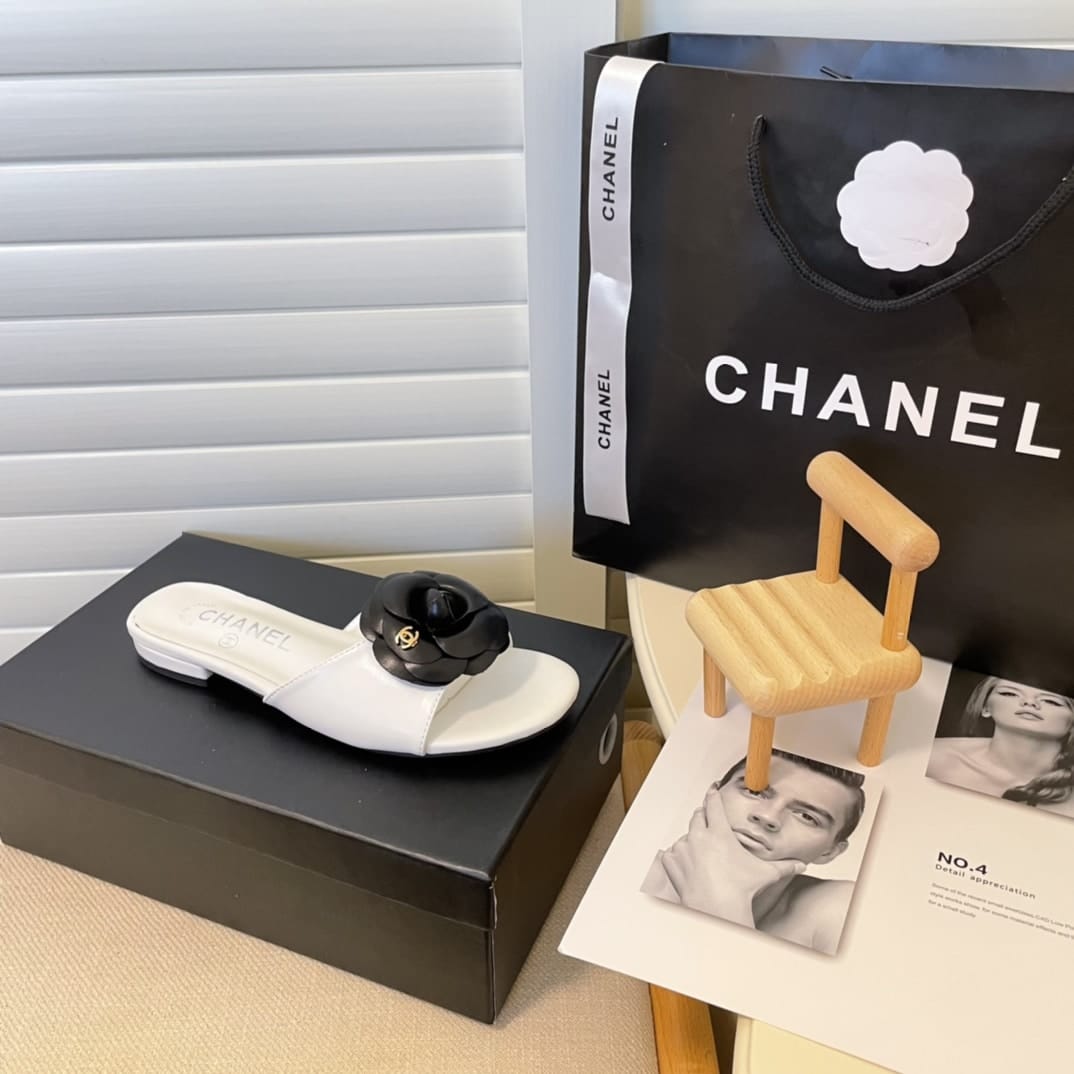Chanel Black Camellia Slides White