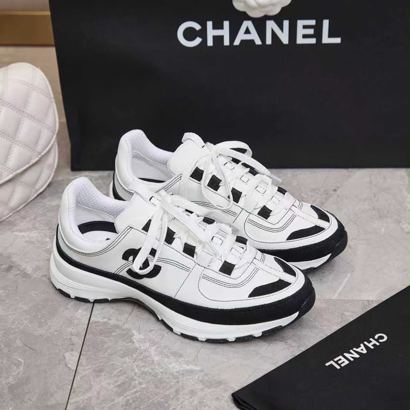 Chanel Lace Up Sneakers White Black