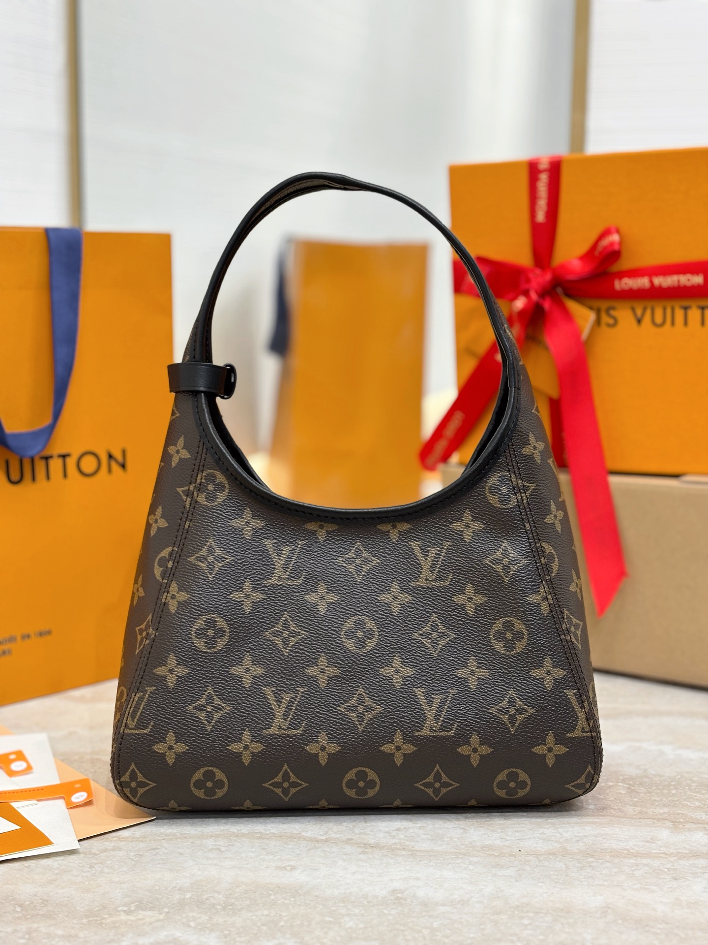 Louis Vuitton The Drop Pm Monogram Canvas M12940