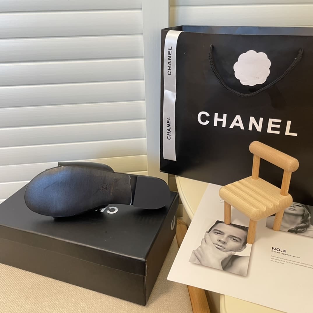 Chanel White Camellia Slides Black