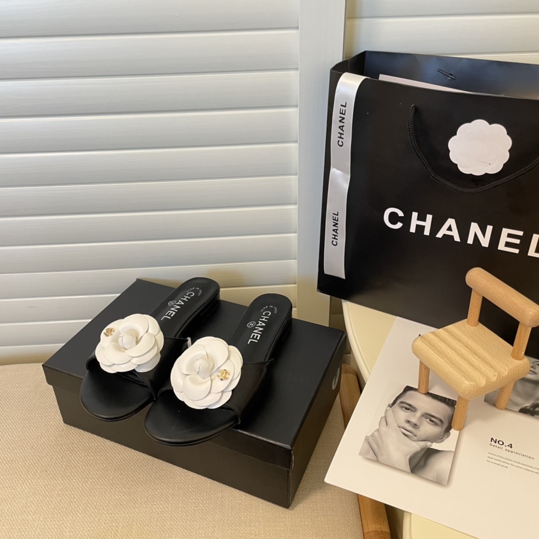Chanel White Camellia Slides Black