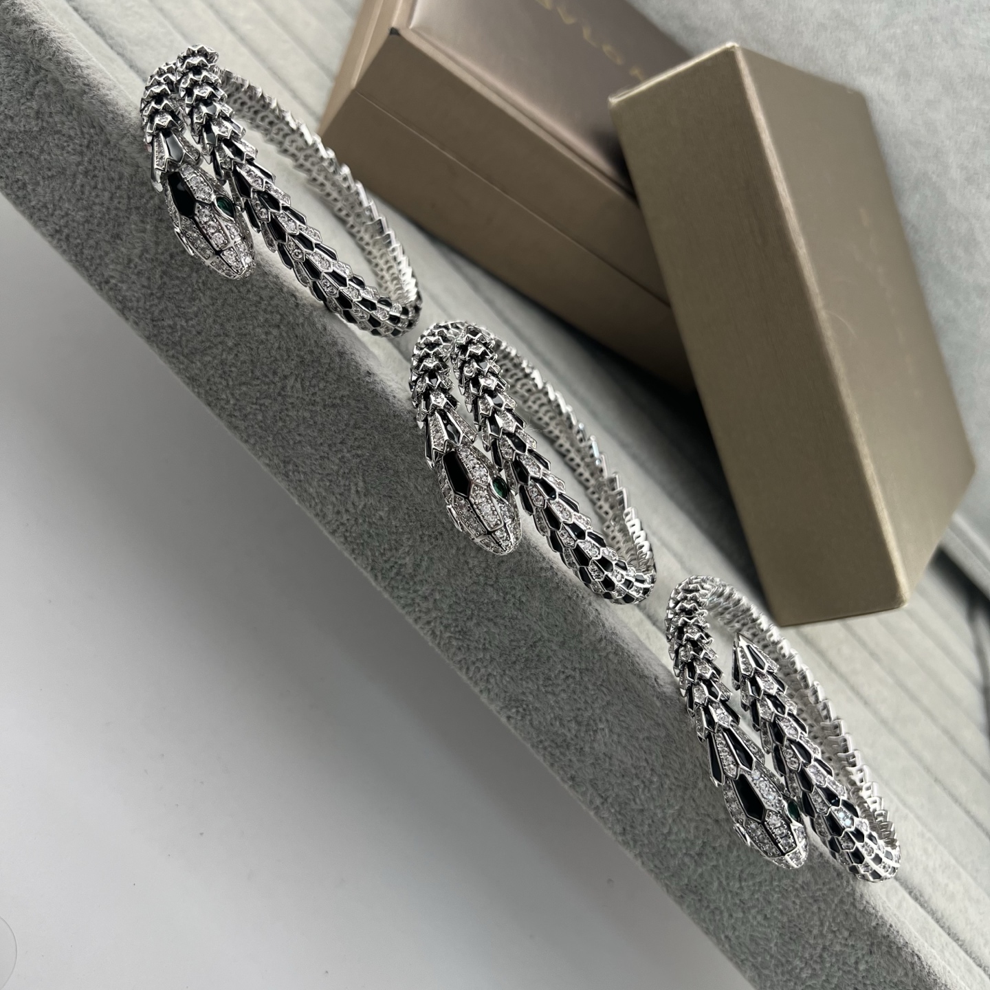 Serpentine black onyx and diamond coil-arm spring bracelet