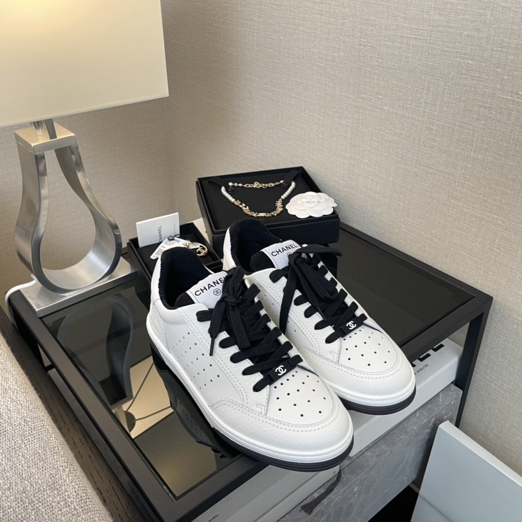 Chanel White/Black Leather Logo Sneakers