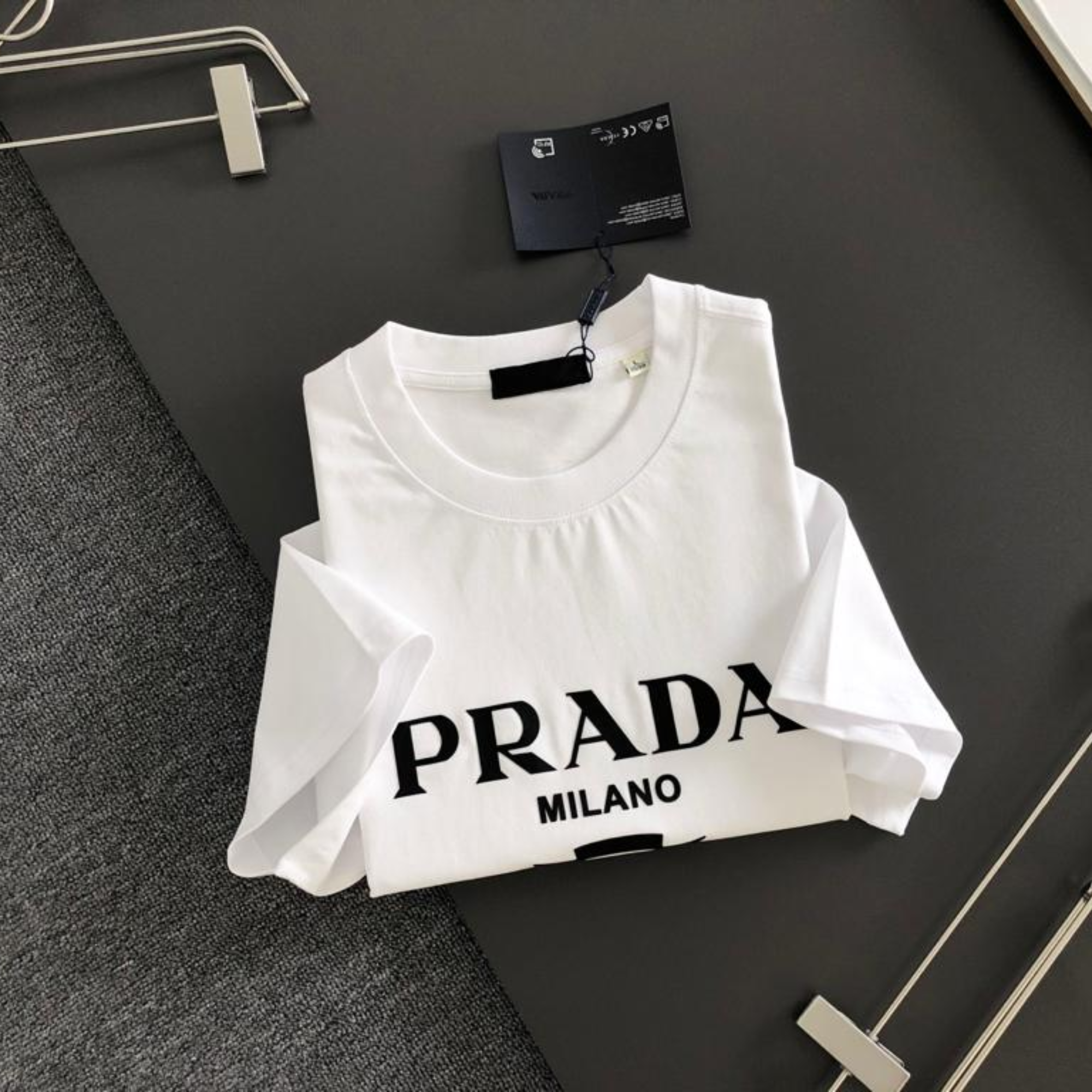 Prada Milano White Black Logo.