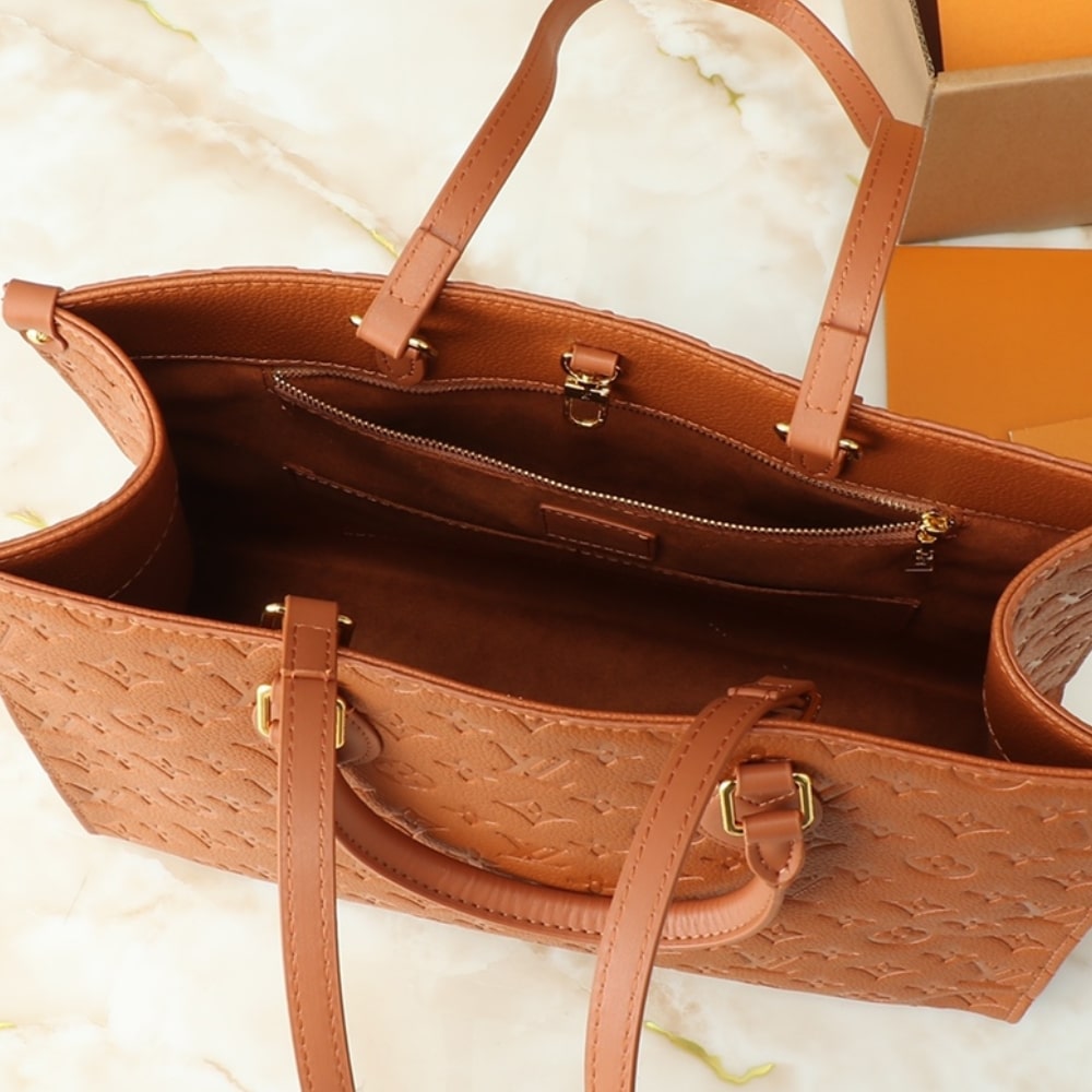 Louis Vuitton On The Go MM Monogram Empreinte Leather Cognac 35Cm M12775