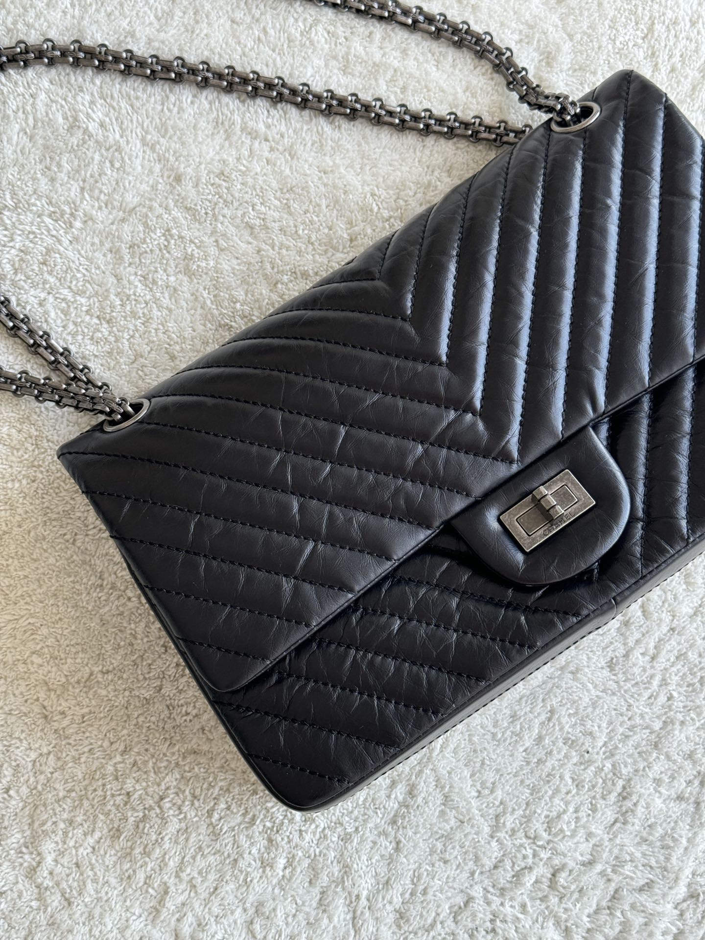 2.55 Reissue 227 Jumbo Flap Bag in Black Aged Calfskin with Chevron Quilting and Ruthenium-Finish Hardware