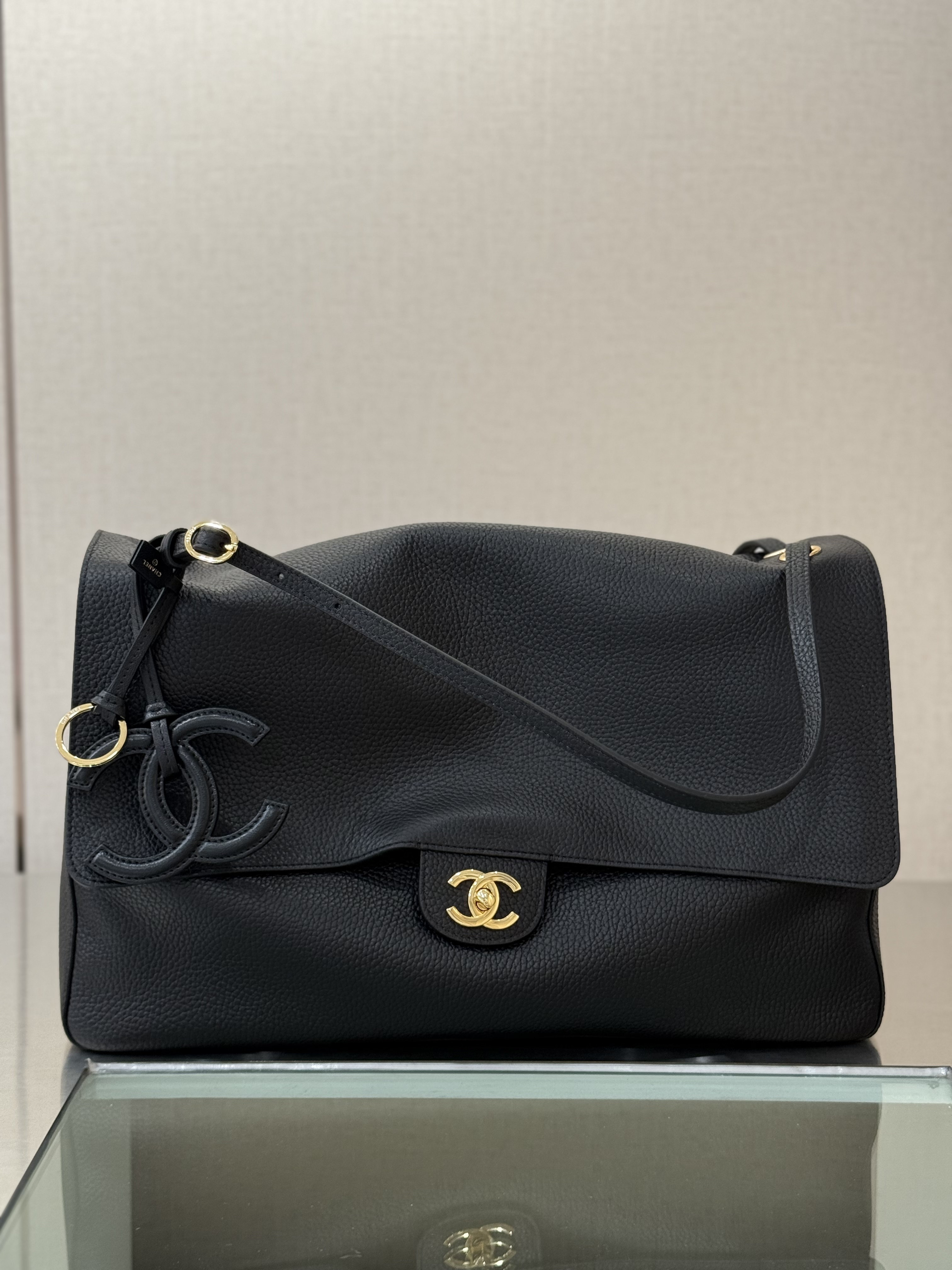 Spring-Summer 2026 Black Grained Calfskin Jennie Maxi Flap Tote Bag with Gold-Tone CC Turn-Lock & Logo Charm