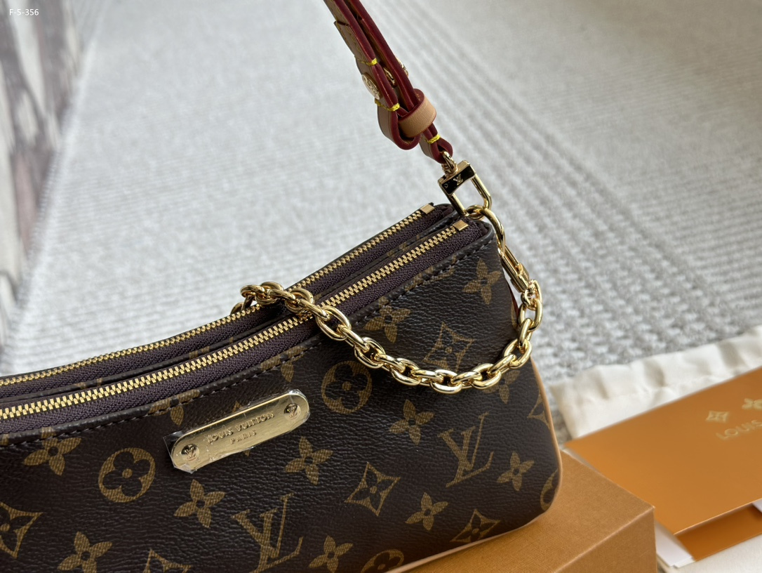 Louis Vuitton Liv Pochette Monogram Coated Canvas 20Cm M83008