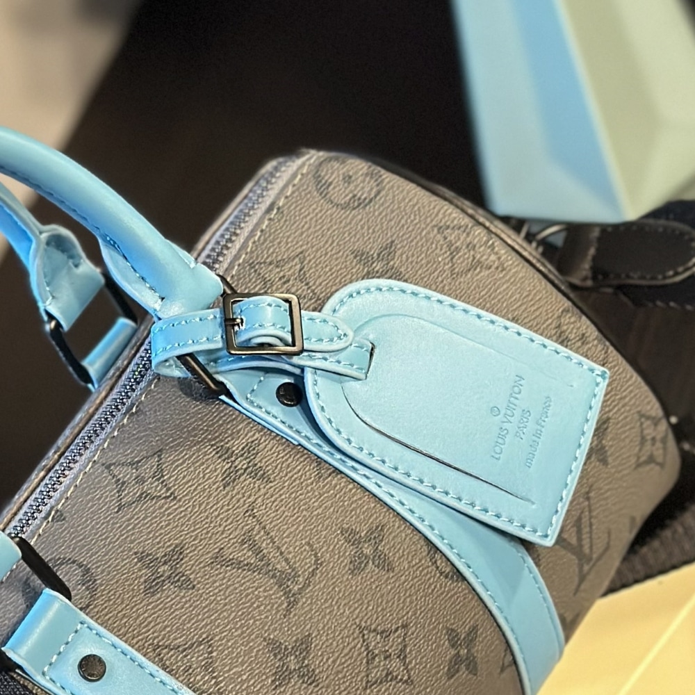 Louis Vuitton Keepall Bandoulière 25 Monogram Eclipse Reverse Coated Canvas Turquoise 25cm M11645