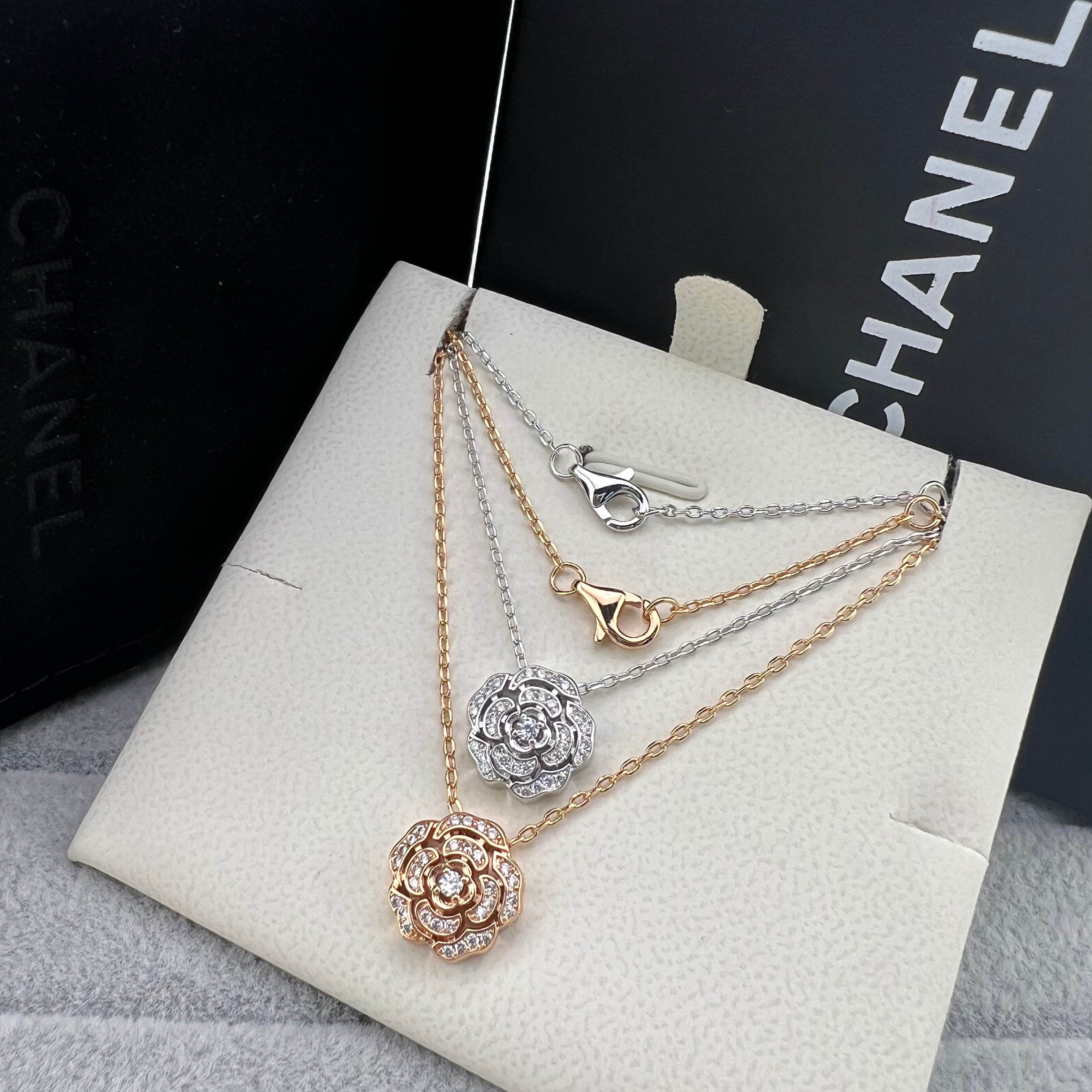 Openwork camellia necklace with full diamonds