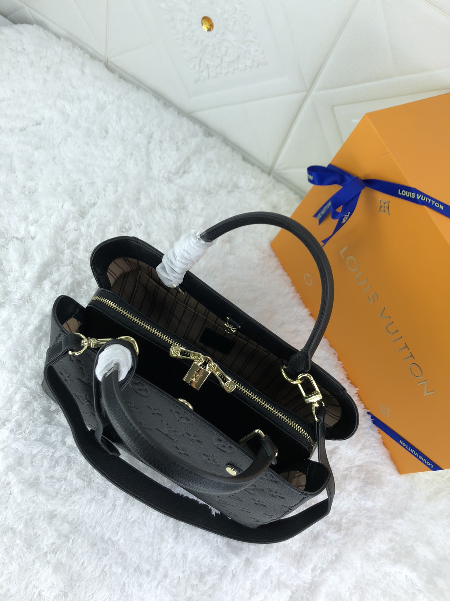Louis Vuitton Montaigne MM Monogram Empreinte Leather Black 33Cm M41048