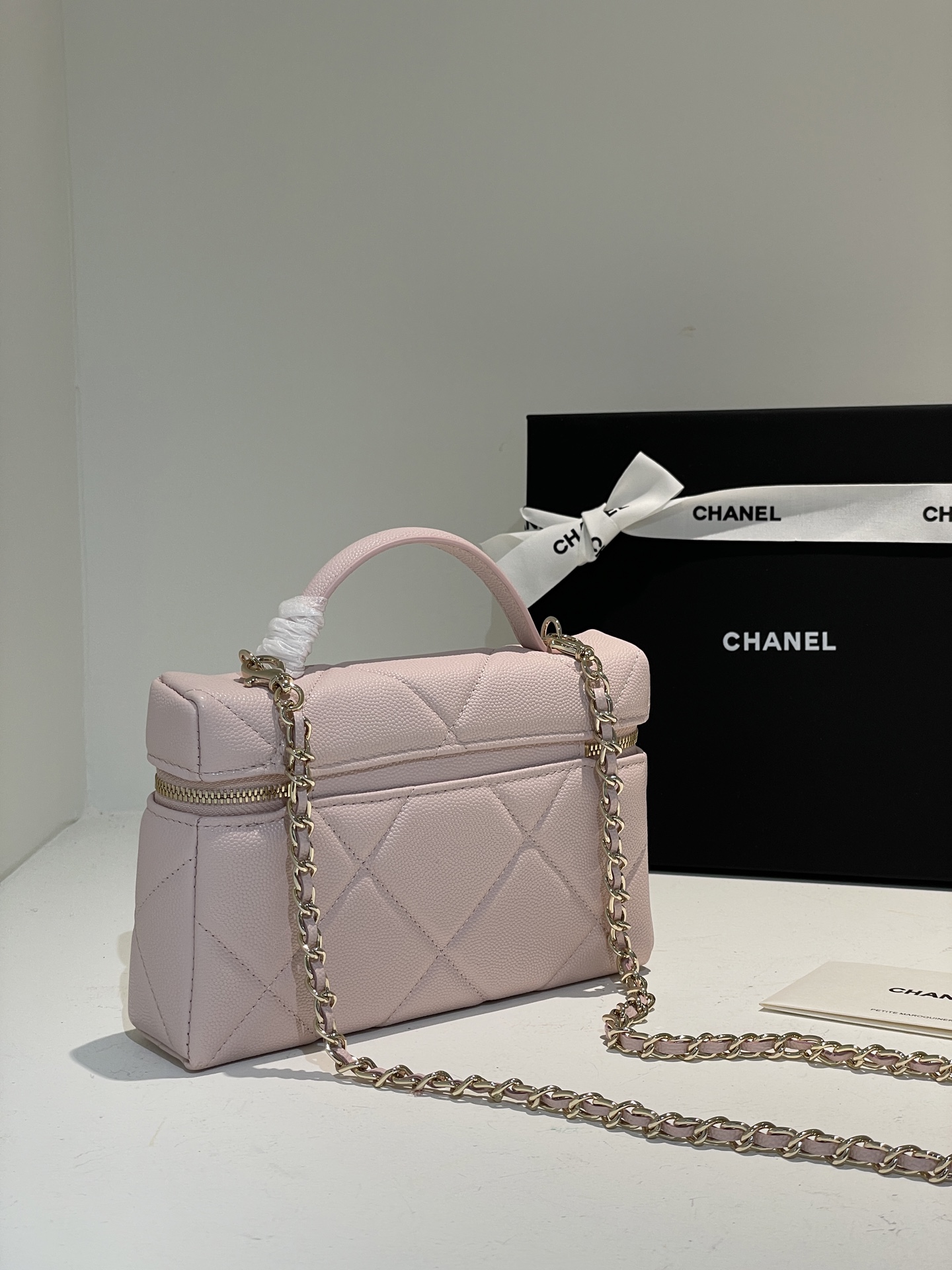 Light Pink Quilted Caviar Calfskin Vanity Case with Top Handle and Gold-Tone Chain Strap