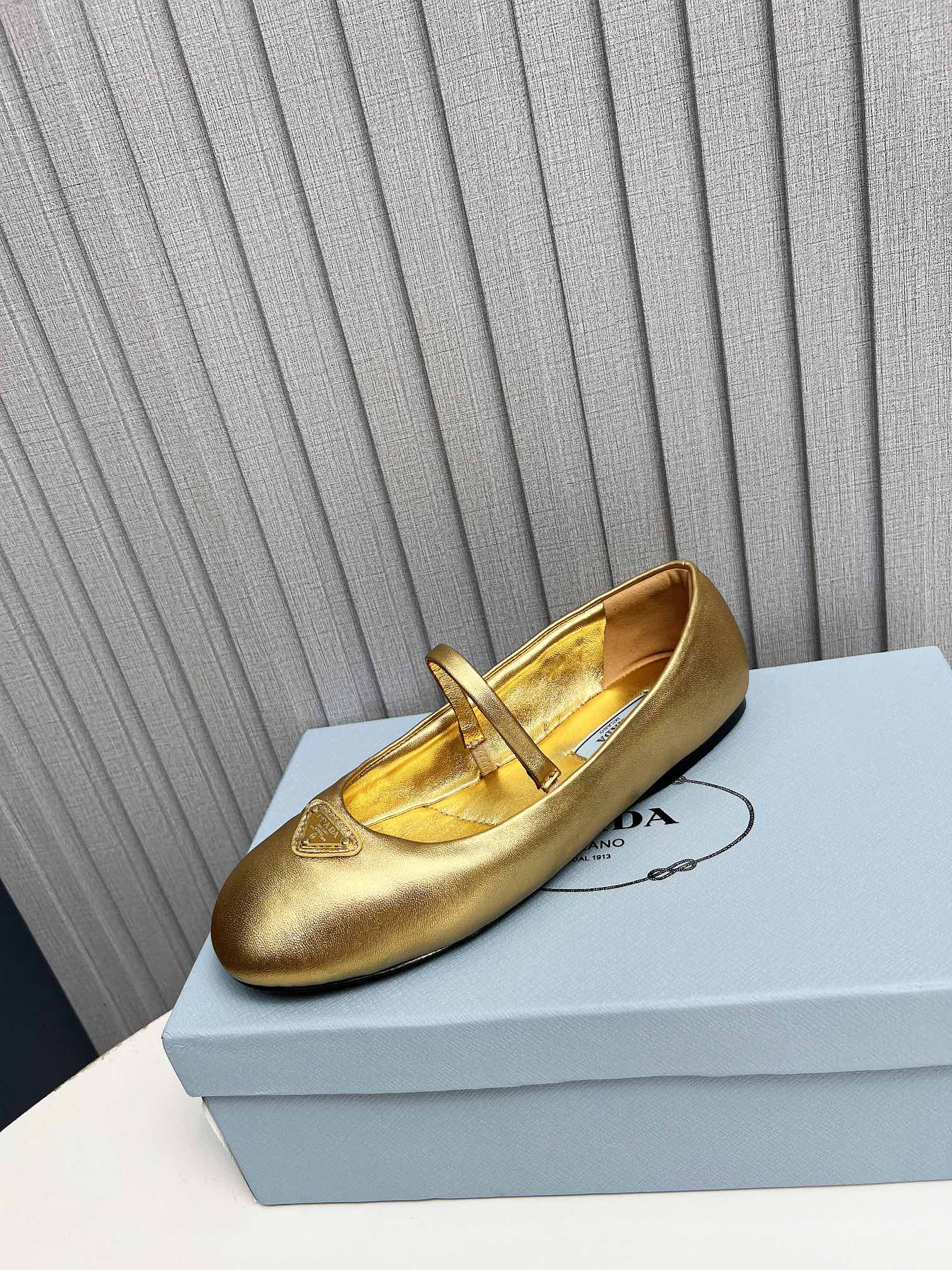 Prada Soft Padded Nappa Leather Ballerinas Gold