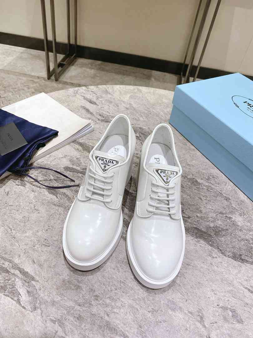 Prada Heeled Brushed Leather Lace-Ups White