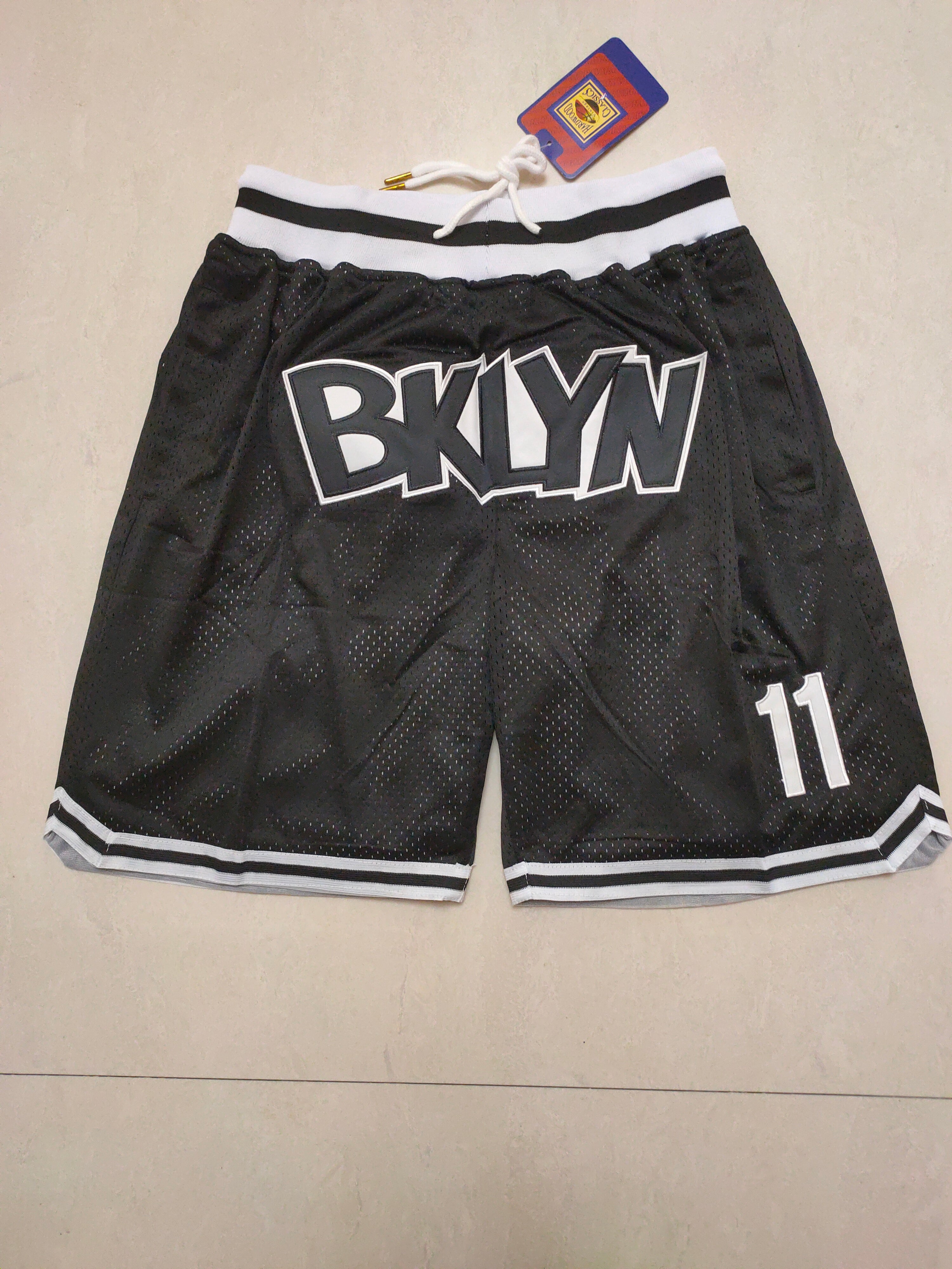 Brooklyn Nets black size 11 pocket pants