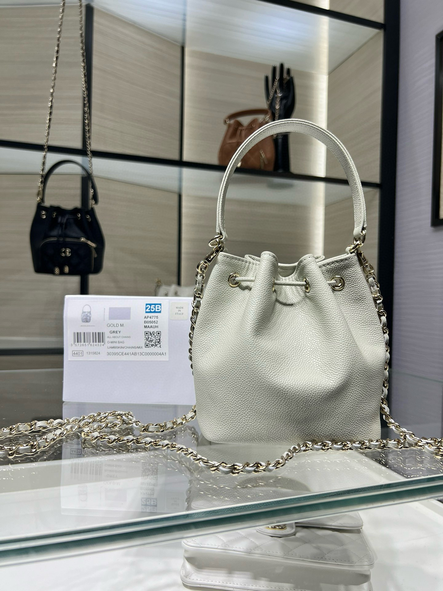 Small Drawstring Bucket Bag in Grey Quilted Grained Calfskin with Gold-Tone Metal (Model AP4775)