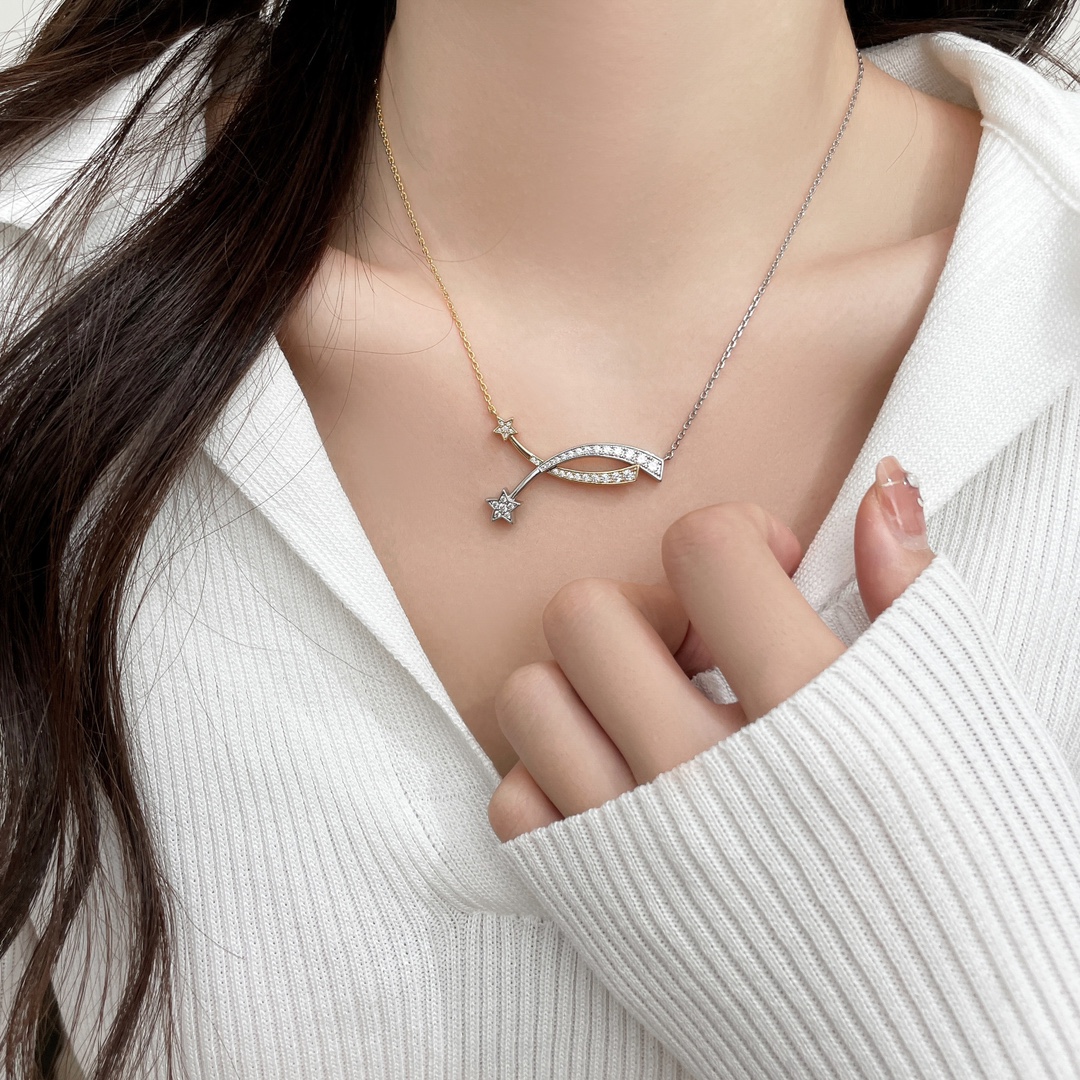 Two-tone comet necklace