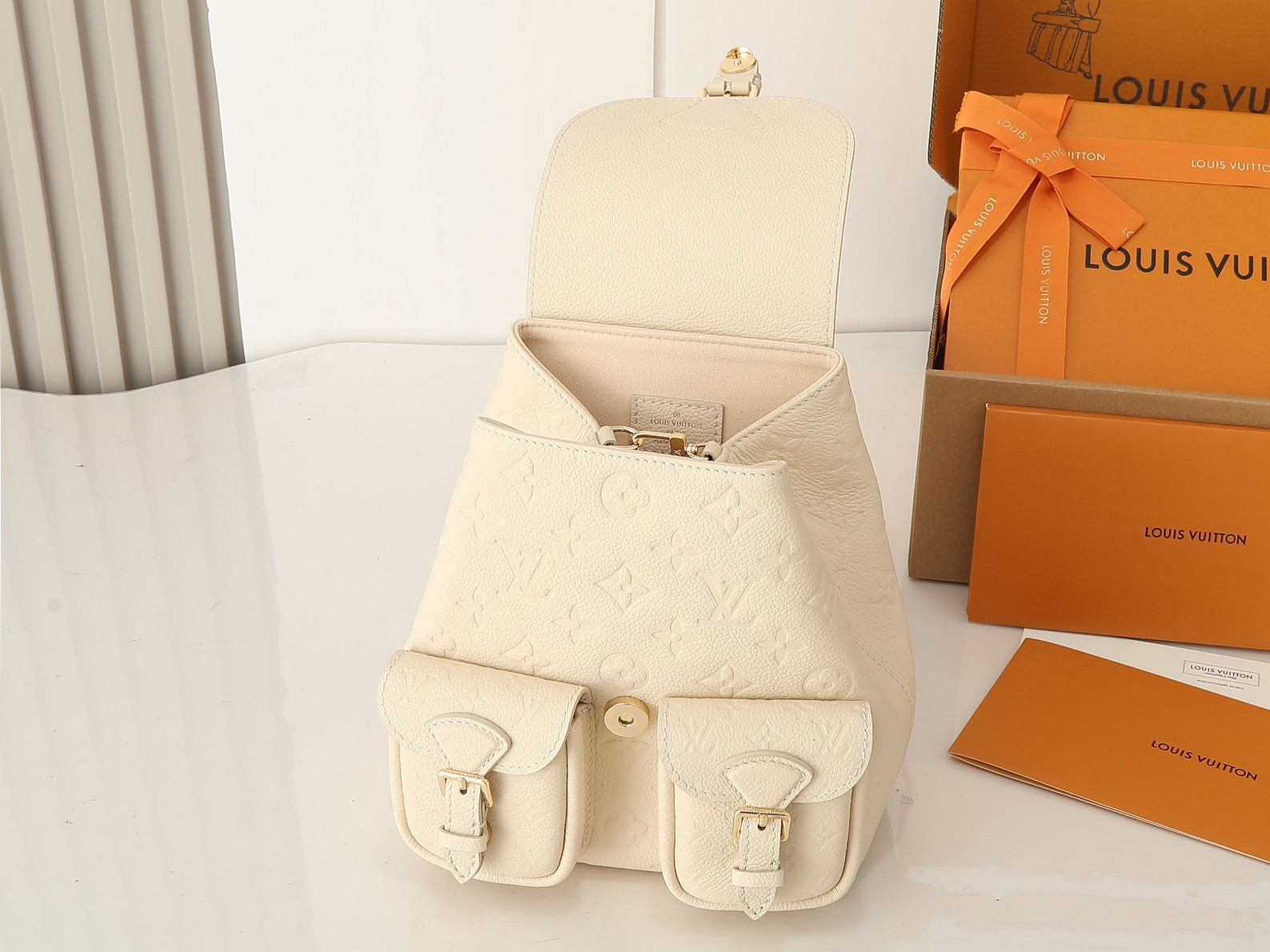Louis Vuitton Backup Backpack – Monogram Empreinte Leather Cream M47106 22cm/ 8.7cm