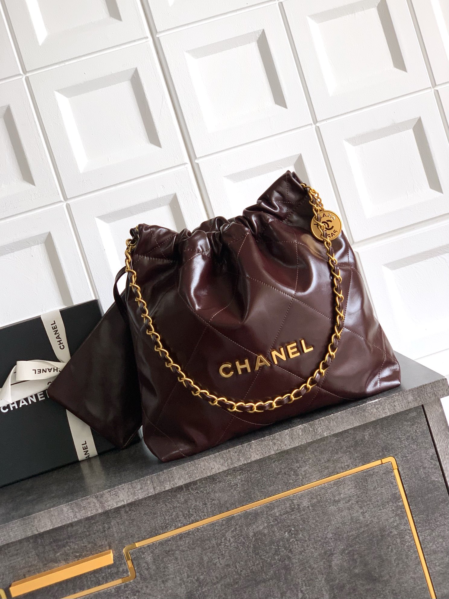 CHANEL 22 Handbag Shiny Calfskin & Gold-Tone Metal Dark Brown