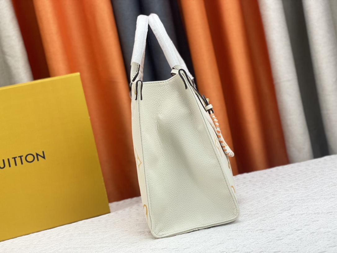 Louis Vuitton On The Go Mm Monogram Empreinte Leather White 34Cm M45717