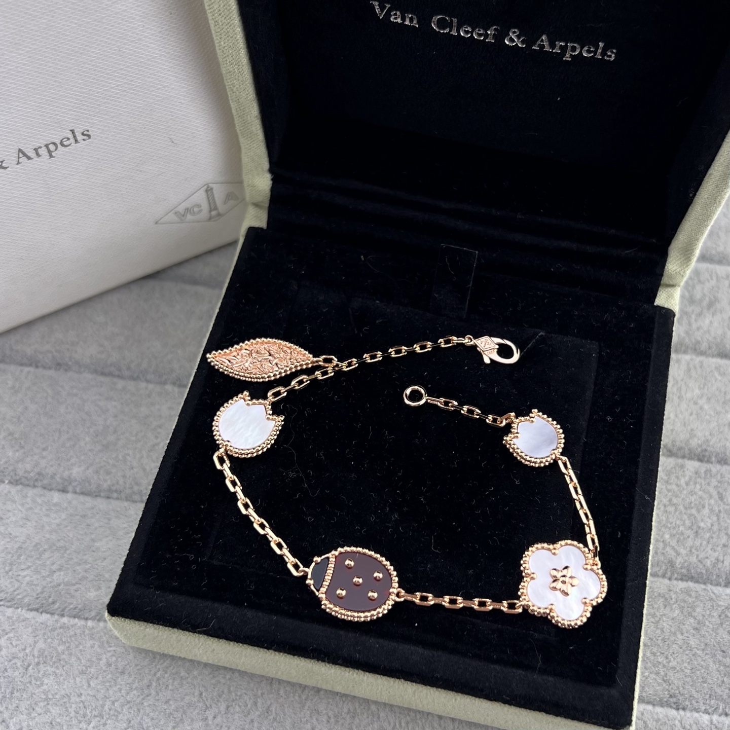 Rose gold ladybug flower and leaf combination necklace