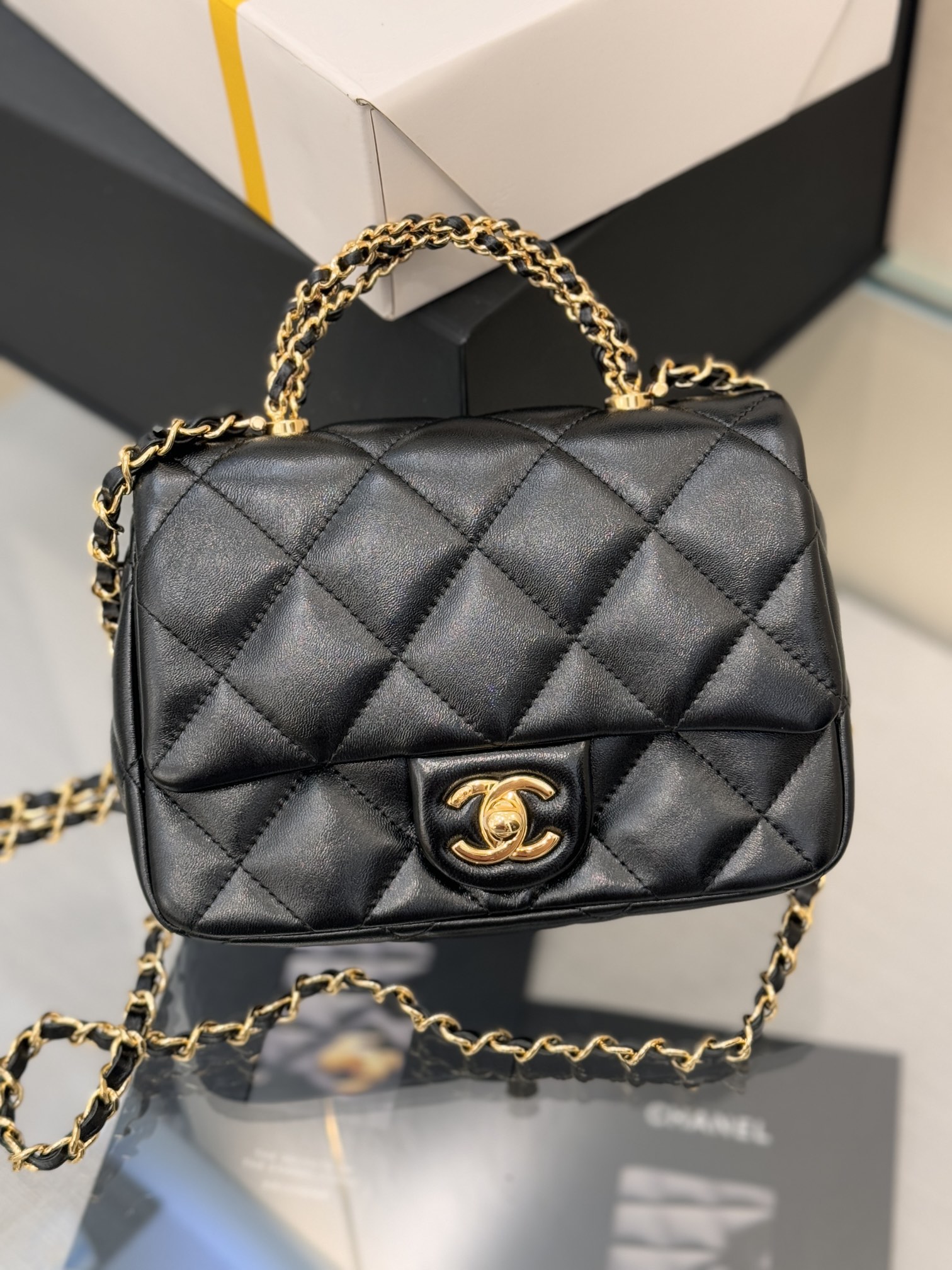 24B Classic Flap Mini with Twist Handle in Black Waxed Lambskin with Gold-Tone Hardware (Model AS5166)