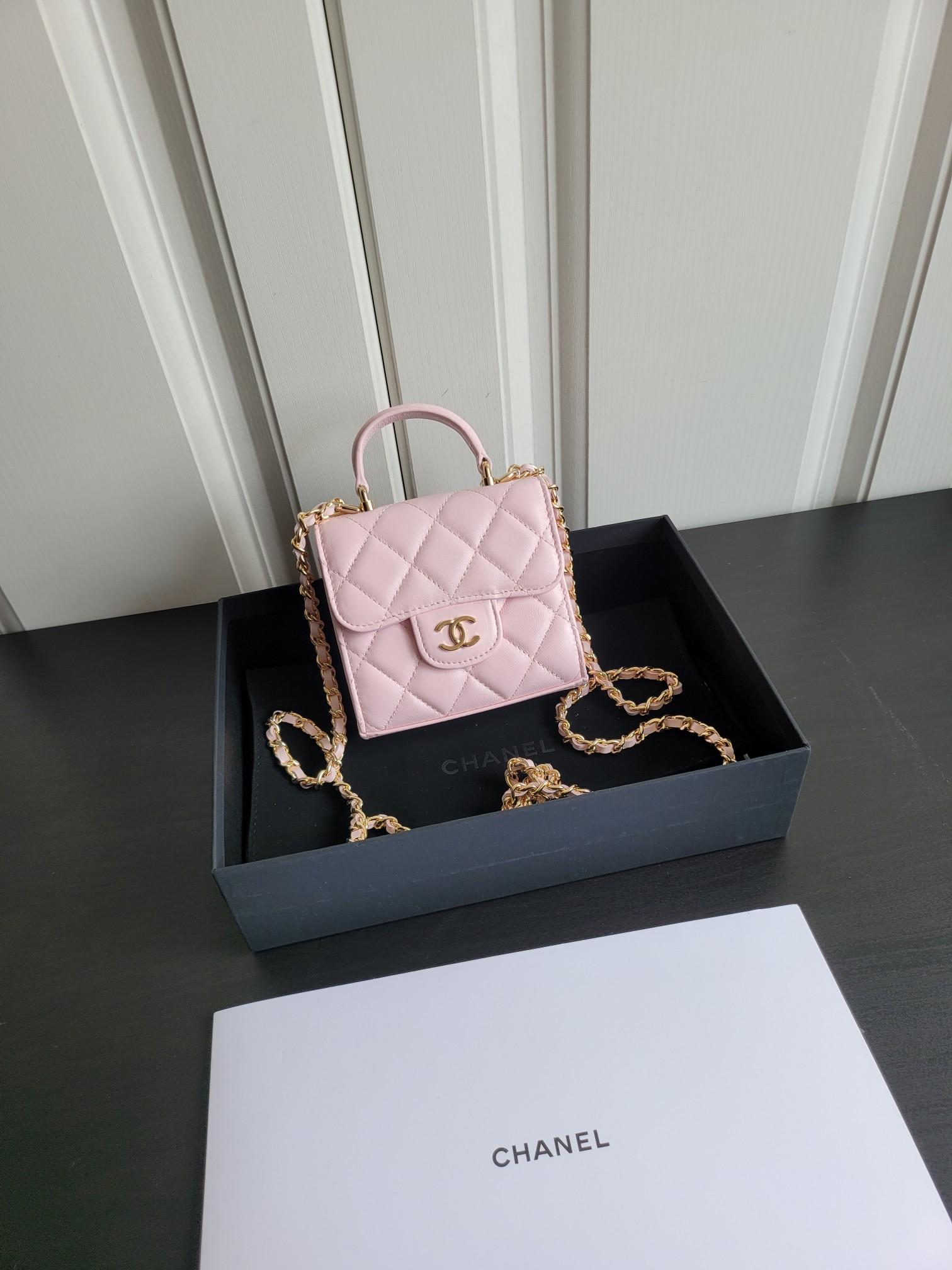 23P Mini Classic Flap Bag with Top Handle in Sakura Pink Quilted Smooth Lambskin with Light Gold-Tone Hardware