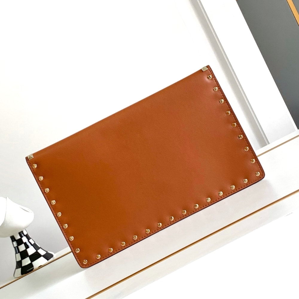 Valentino Garavani Rockstud Raffia Clutch Bag In Brown 28Cm