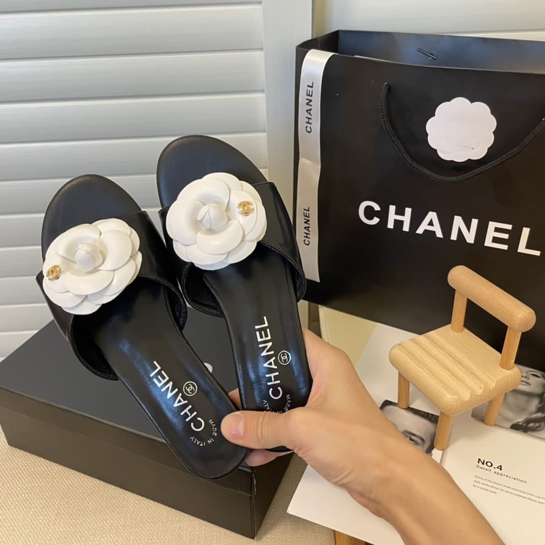 Chanel White Camellia Slides Black