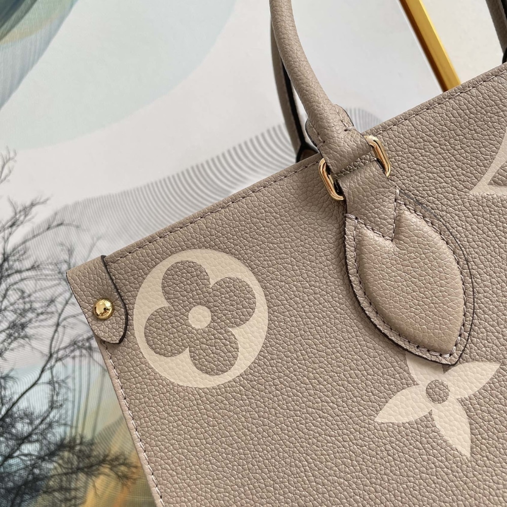 Louis Vuitton Onthego MM Monogram Empreinte Leather Tote Bag Dove Cream 35cm M45494