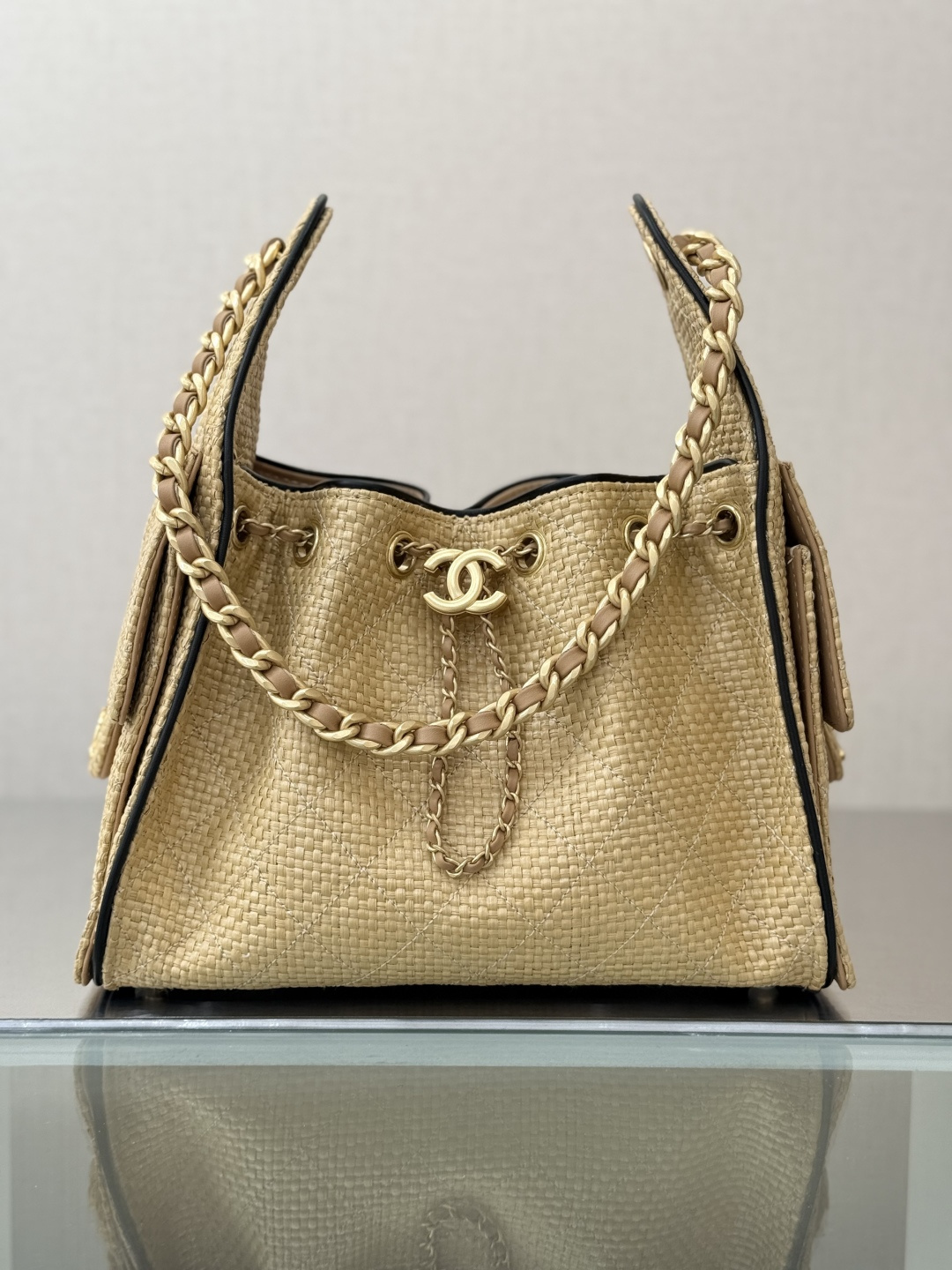 Cruise 2026 Beige Raffia & Calfskin Drawstring Bucket Bag with Gold-Tone Hardware & Chain Strap