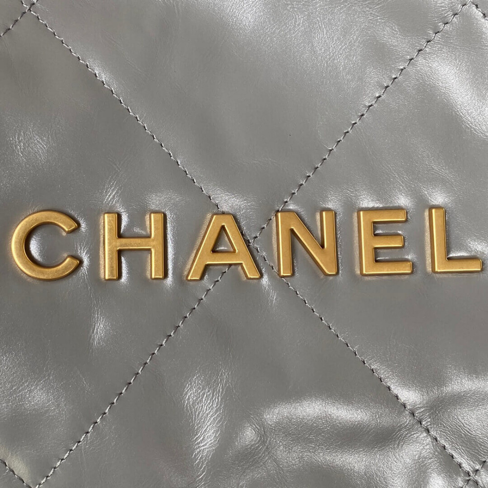 Chanel 22 Small Handbag Shiny Calfskin Grey With logo Gold