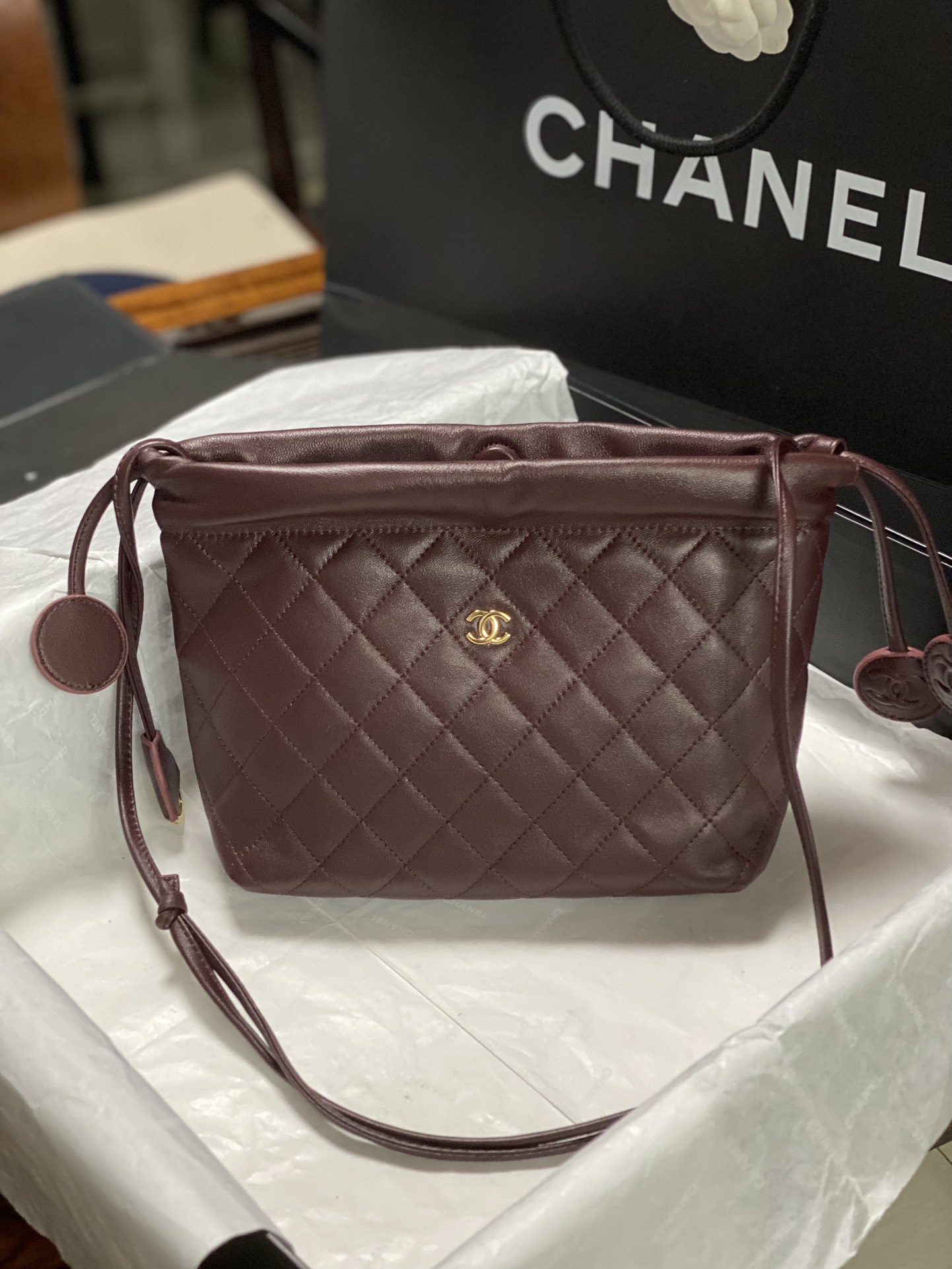 26C Burgundy Quilted Lambskin Drawstring Bucket Bag with Gold Hardware