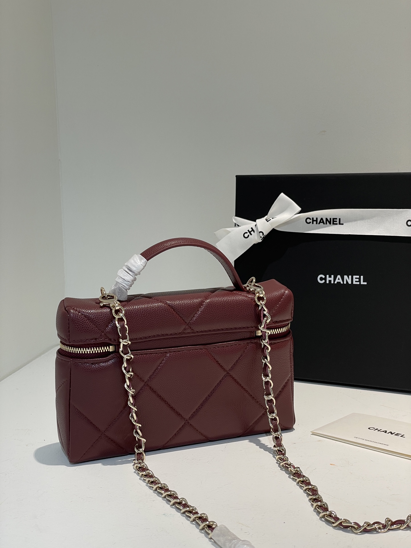 Burgundy Quilted Caviar Calfskin Vanity Case with Top Handle and Gold-Tone Chain Strap
