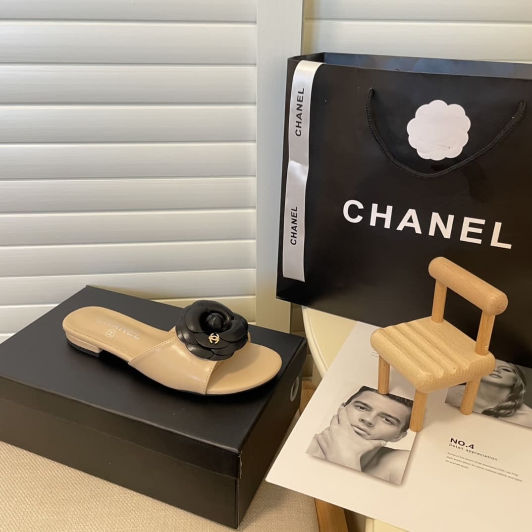 Chanel Black Camellia Slides Beige