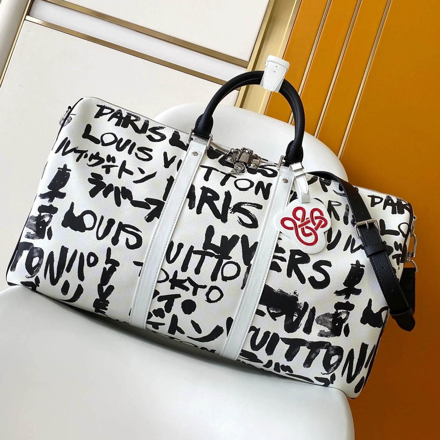 LVx N&PW Keepall Bandoulière 50 Black White Cowhide