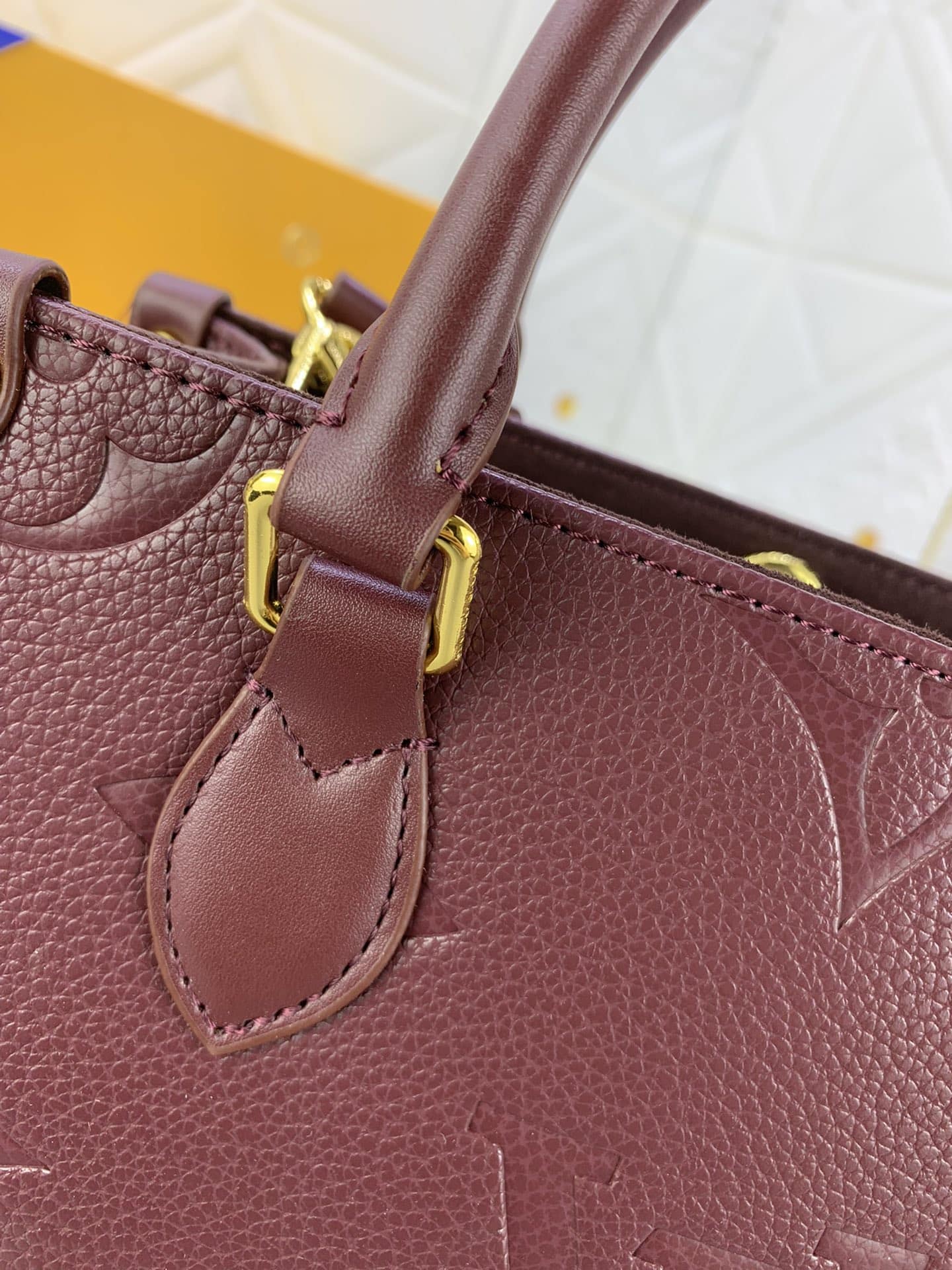 Louis Vuitton Onthego MM Monogram Empreinte Wine Red 25Cm M46601