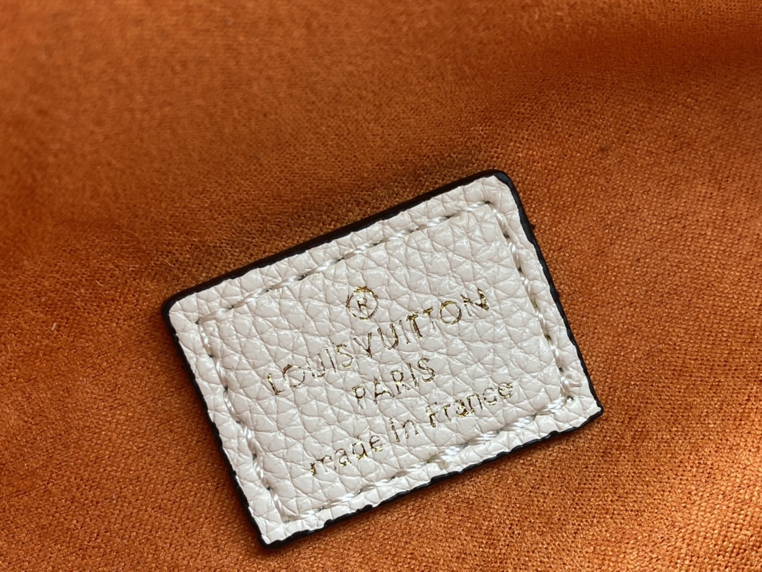 Louis Vuitton Monogram Empreinte Creme Bumbag 37cm/14.6in M44836