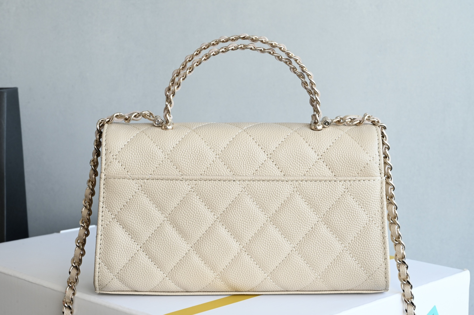 25S Top Handle Kelly Clutch with Chain in Beige Caviar Leather with Light Gold-Tone Hardware (Model AS4711)