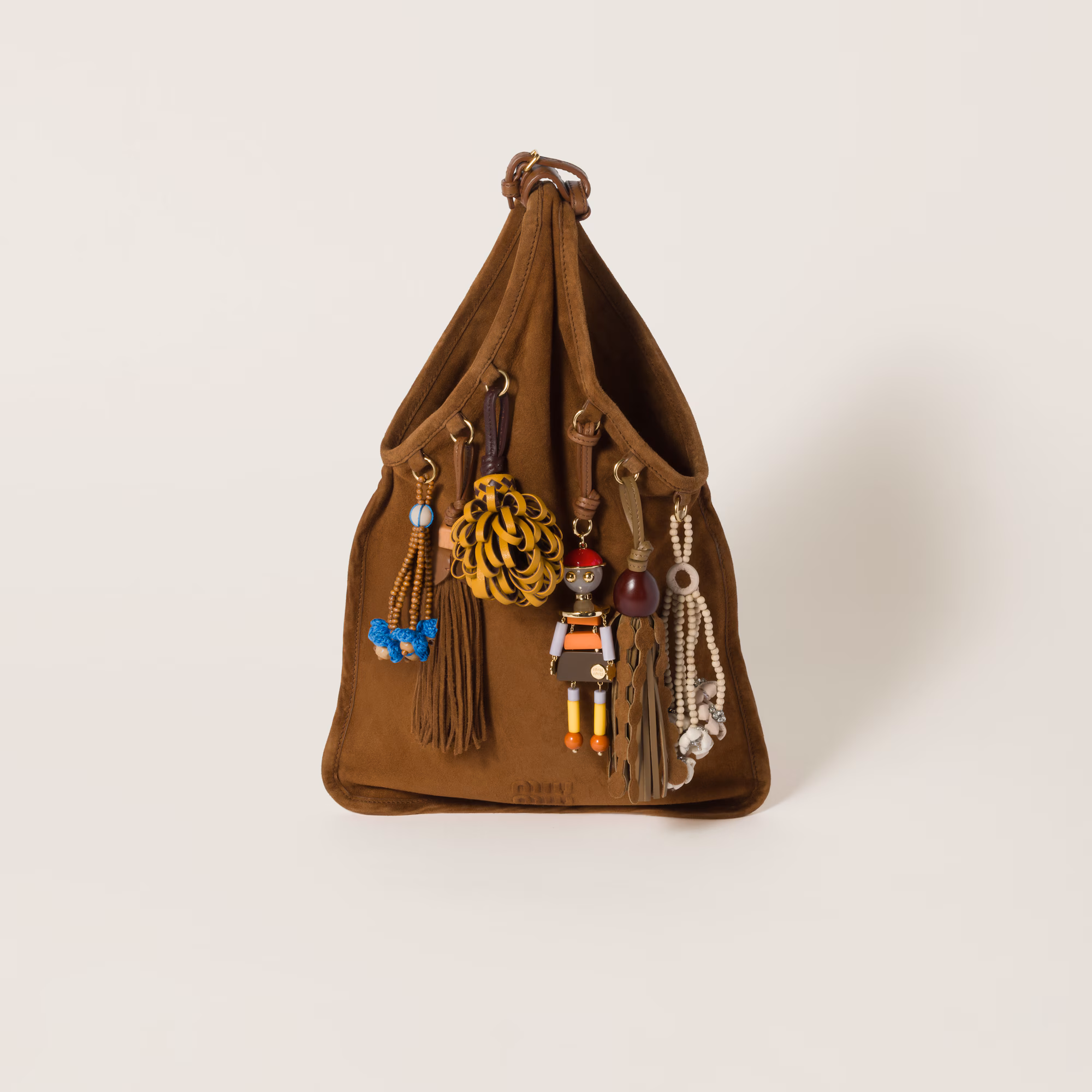 MIUMIU-ROM THE RUNWAY Suede bag with trick
