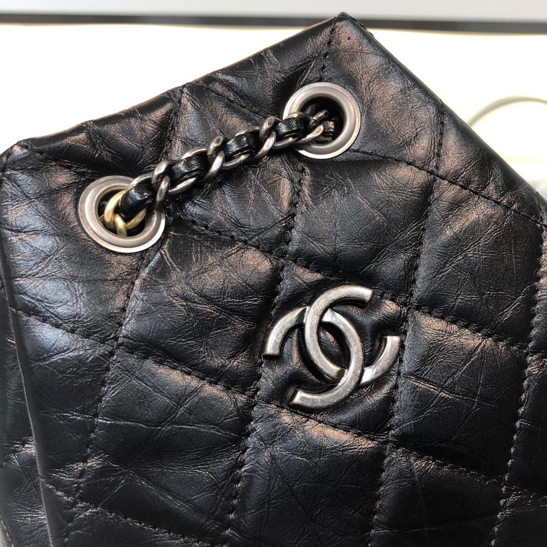 Gabrielle Small Quilted Aged Calfskin Backpack in Black