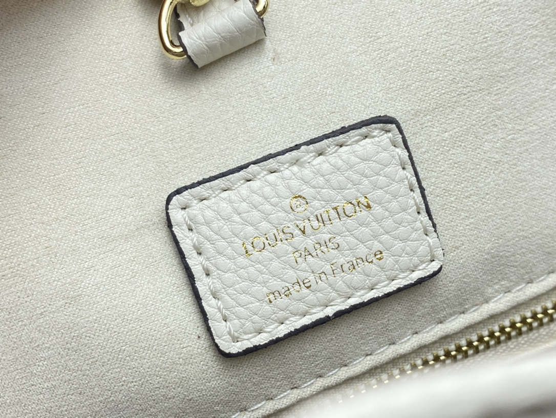 Louis Vuitton On The Go Mm Monogram Empreinte Leather White 34Cm M45717