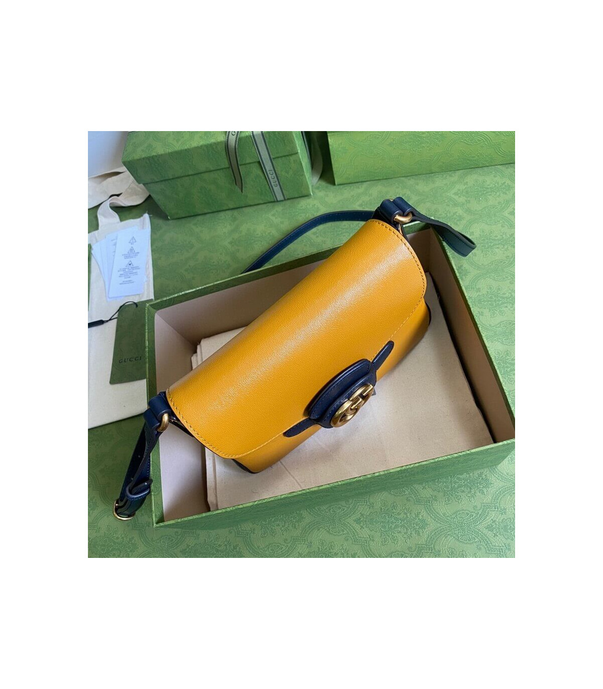 Gucci Small Messenger Bag with Double G 648934