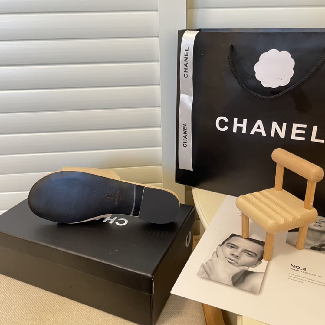 Chanel Black Camellia Slides Beige