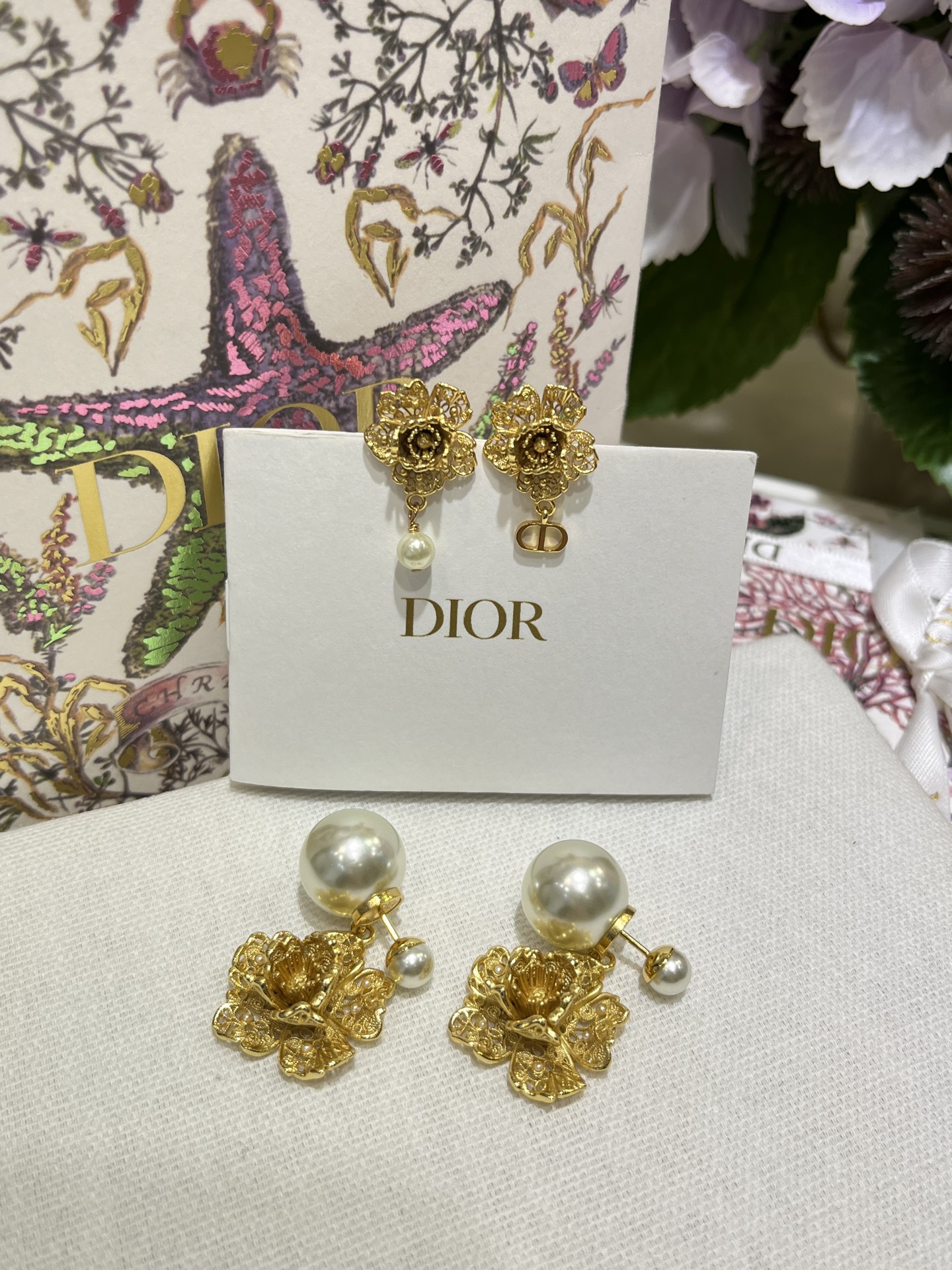 Dior Hollow peony pearl double ball earrings