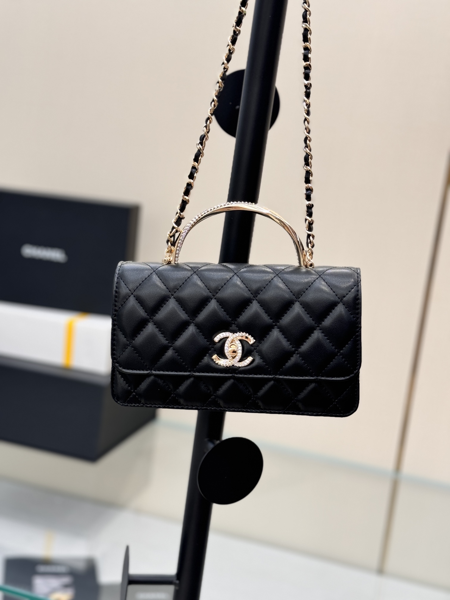 Wallet on Chain (WOC) with Crystal-Embellished Handle in Black Quilted Lambskin with Gold-Tone Hardware
