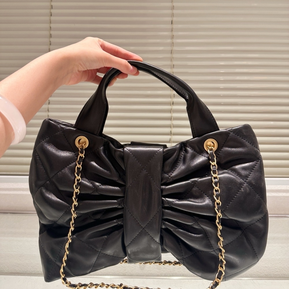Chanel Maxi Bow Bag Shiny And Gold Tone Metal Black 51Cm