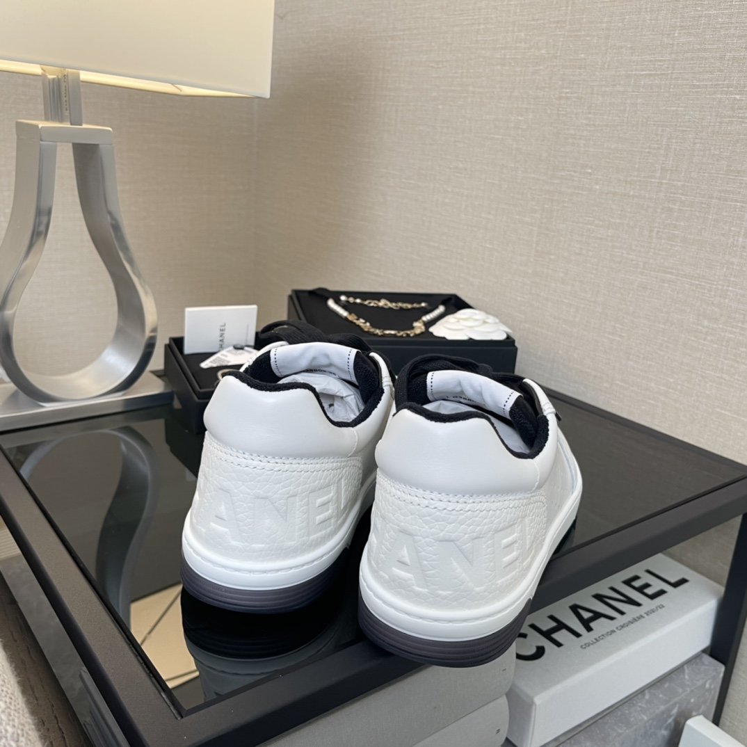 Chanel White/Black Leather Logo Sneakers